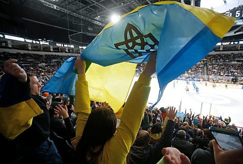 JOHN WOODS / WINNIPEG FREE PRESS
Ukraine fans celebrate a goal against the U of MB Bisons during third period action in Winnipeg on Monday, January 9, 2023.