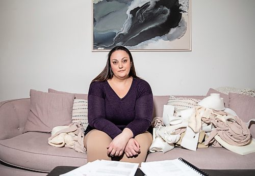 JESSICA LEE / WINNIPEG FREE PRESS

Emma Cloney, 38, is photographed at her home with her bandages on January 10, 2023. She suffers from lipedema, a debilitating condition which causes excess fat growth and must wrap herself with bandages every day to manage symptoms. The process takes hours of her day and makes it difficult for her to do simple tasks.