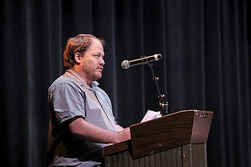 Kirk Carr, a parent and president of the Brandon and District Labour Council, speaks during a child-care town hall meeting at the Western Manitoba Centennial Auditorium on Tuesday evening. (Tim Smith/The Brandon Sun)