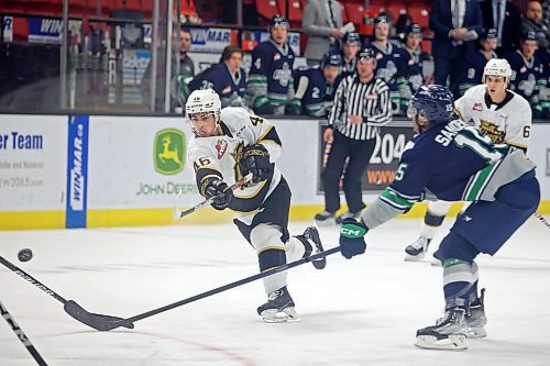 10012023
Dawson Pasternak #46 of the Brandon Wheat Kings fires off a shot on net during WHL action against the Seattle Thunderbirds at Westoba Place on Tuesday evening. 
(Tim Smith/The Brandon Sun)