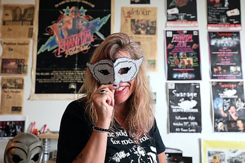 RUTH BONNEVILLE /  WINNIPEG FREE PRESS 

ENT - Phantom fan

Gloria Dignazio is a subject in the Phantom of Winnipeg documentary premiering in the Montreal this week. She has been a key organizer of the local Phantompalooza events and is a longtime fan of Phantom of the Paradise.  

Portraits taken in her home next to her collection of Phantom memorabilia.  


Eva Wasney story. 

July 3rd,  2019