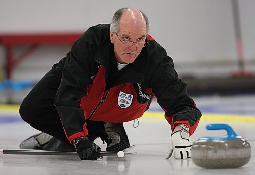 Ray Orr throws a rock during the 2009 Provincial Masters Men's Curling Final at the Minnedosa Curling Club. Orr's Minnedosa rink, which went on to win the national championship that same year, is part of the Manitoba Curling Hall of Fame and Muesum's 2023 induction class. (Tim Smith/The Brandon Sun)
