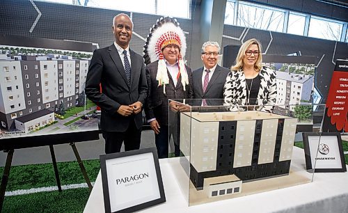 MIKE DEAL / WINNIPEG FREE PRESS
(from left) Federal Minister of Housing and Diversity and Inclusion, Ahmed Hussen; Opaskwayak Cree Nation Chief Sidney Ballantyne; Federal Minister of Northern Affairs and Minister responsible for Prairies Economic Development Canada, Dan Vandal and Manitoba Minister of Families, Rochelle Squires attend the ground breaking and funding announcement for an new seven story housing complex next to the University of Winnipeg, Wednesday afternoon.
See Gabrielle Piche story
230111 - Wednesday, January 11, 2023.