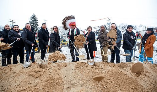 MIKE DEAL / WINNIPEG FREE PRESS
Opaskwayak Cree Nation Chief Sidney Ballantyne (centre) with dignitaries perform the obligatory ground breaking ceremony.
Opaskwayak Cree Nation Chief Sidney Ballantyne along with Federal Minister of Housing and Diversity and Inclusion, Ahmed Hussen; Federal Minister of Northern Affairs and Minister responsible for Prairies Economic Development Canada, Dan Vandal; Manitoba Minister of Families, Rochelle Squires; CEO of Paragon Design Build, Nigel Furgus, along with many other dignitaries and guests attend the ground breaking and funding announcement for an new seven story housing complex next to the University of Winnipeg, Wednesday afternoon.
See Gabrielle Piche story
230111 - Wednesday, January 11, 2023.