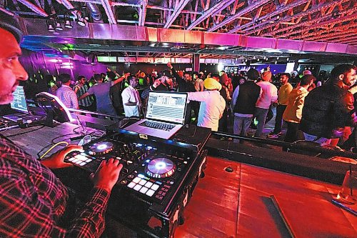 PRABHJOT SINGH LOTEY / WINNIPEG FREE PRESS

The DJ (waiting on his name) playing the latest bhangra hits at Winnipeg Desi Nights (WDE) in Obsidian Lounge, Pembina Highway