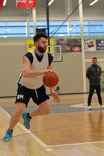 Blake Magnusson drives during Brandon University Bobcats men's basketball practice on Thursday. (Thomas Friesen/The Brandon Sun)