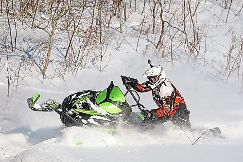 Brandon Sun 17012021

Luke McNabb plays in the deep snow near his home outside Minnedosa on his snowmobile on a blustery Tuesday afternoon.   (Tim Smith/The Brandon Sun)