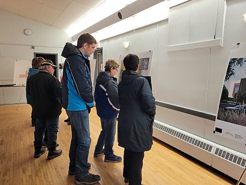 Local residents take a look at architectural plans for Neepawa's new hospital, located 74 kilometres northeast of Brandon, which will be complete in 2025. (Miranda Leybourne/The Brandon Sun)