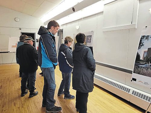 Local residents take a look at architectural plans for Neepawa's new hospital, located 74 kilometres northeast of Brandon, which will be complete in 2025. (Miranda Leybourne/The Brandon Sun)