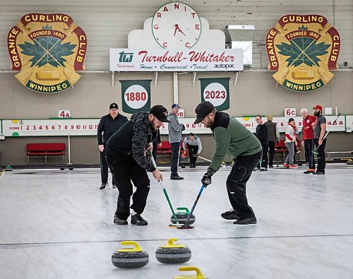 JESSICA LEE / WINNIPEG FREE PRESS

Ryan Brooks (in black) and Hartley Vanstone (in green) are photographed curling on January 12, 2023 at The Granite Curling Club.

Reporter: Taylor Allen