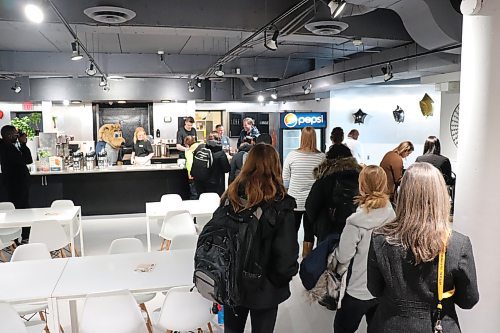 Brandon University staff and students line up Friday morning to order some food and drinks from the Bailey's, the school's newest café located in the Knowles-Douglas building. (Kyle Darbyson/The Brandon Sun)