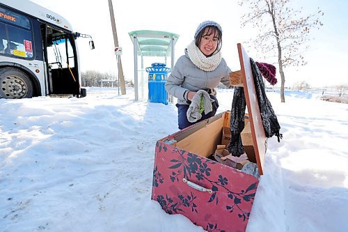 RUTH BONNEVILLE / WINNIPEG FREE PRESS 

LOCAL - McIvor loop box

Photo of Taylor Boucher next to the McIver Box she made as part of a school project, at the McIver Bus Loop.  

See story by  Longhurst.


Story: When challenged by a professor to find ways to improve life in Winnipeg, Taylor Boucher knew what she wanted to do &#x460;help people stay warm in winter.

The 27-year-old North Kildonan resident takes transit to classes at the University of Winnipeg, waiting for the bus at McIvor Loop in the northeast corner of the city.

So when Sandy Pool, who teaches a class titled Topics in Local, National, &amp; Global Cultures: Social Justice and Writing the City, told Boucher and other students in the class to think of the &#x4a7;ood and helpful things they could do&#x4e0;in Winnipeg, she decided to make the McIvor Loop Box.

On the top, Boucher placed a notice that says: &#x488;ello McIvor Loop! In an effort to show care and keep our community warm as the season gets colder, your neighbours have created the McIvor Loop Box.&#x4cd;

Jan 13th,  2023