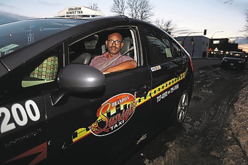 Brandon Sun Brandon Sunset Taxi driver Yosief Dawit is pictured while making the rounds on Monday, approximately seven years after first turning the ignition as a local cabbie. His manager, Solomon Yilma, is raising red flags when it comes to the possibility of ride-hailing services such as Uber coming to the Wheat City. (Tyler Clarke/The Brandon Sun)