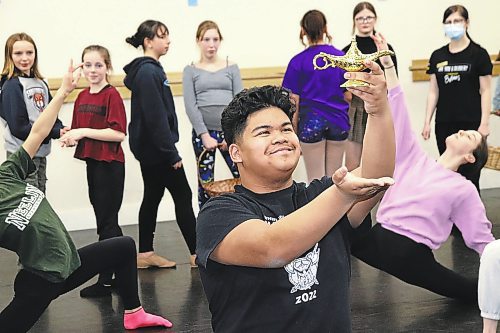 Miguel Tarubal strikes a pose during a recent rehearsal for "Aladdin Jr.," which took place at the Brandon School of Dance on Saturday. Tarubal is playing the Genie in this latest show from DI Productions, the first major play the company has put together since the start of the COVID-19 pandemic. See story on Page A3. (Kyle Darbyson/The Brandon Sun)