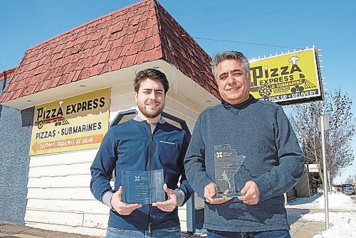 Brandon Sun The second and third generation of Pizza Express leadership are seen with the Family Enterprise Xchange awards they received during the 2017 FEX Manitoba Family Enterprise of the Year Award ceremony in Winnipeg last weekend. From left is third-generation pizza shop leader Tony Vasilarakis and his father, and current owner, Gus Vasilarakis. (Tyler Clarke/The Brandon Sun)