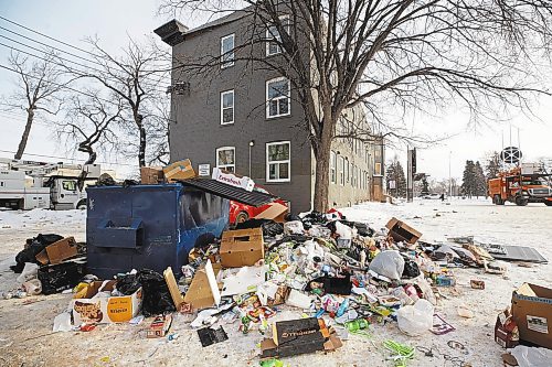 MIKE DEAL / WINNIPEG FREE PRESS
A &#x201c;trash volcano&#x201d; erupting in a back lane of 270 St Johns Avenue.
See Malak Abas story
230109 - Monday, January 09, 2023.