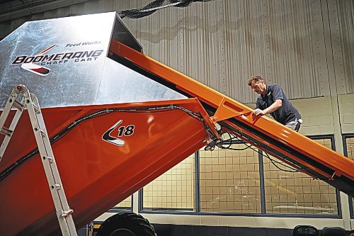 16012023
Eldon Obach prepares a Boomerang Chaff Cart for display at the Keystone Centre on Monday in preparation for Manitoba Ag Days 2023, which begins today. 
(Tim Smith/The Brandon Sun)