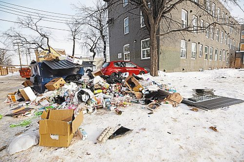 MIKE DEAL / WINNIPEG FREE PRESS
A &#x201c;trash volcano&#x201d; erupting in a back lane of 270 St Johns Avenue.
See Malak Abas story
230109 - Monday, January 09, 2023.