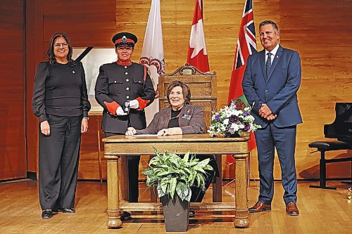 17012023
Manitoba Lieutenant-Governor Anita Neville awards a Queen Elizabeth II Platinum Jubilee Medal to Amanda Conway along with Manitoba Premier Heather Stefanson (L) and MLA Cliff Cullen (R) at the Brandon University Lorne Watson Recital Hall on Tuesday. 80 Westman individuals received medals during the ceremony.  (Tim Smith/The Brandon Sun)