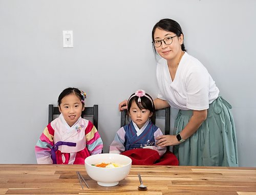 JESSICA LEE / WINNIPEG FREE PRESS

Minhee Kim and her children Dana, 5, and Yena, 3, are photographed with rice cake soup or Tteokguk in their home on January 16, 2023.

Reporter: Eva Wasney