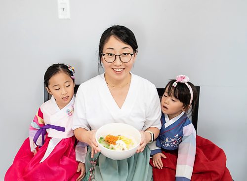 JESSICA LEE / WINNIPEG FREE PRESS

Minhee Kim and her children Dana, 5, and Yena, 3, are photographed with rice cake soup or Tteokguk in their home on January 16, 2023.

Reporter: Eva Wasney