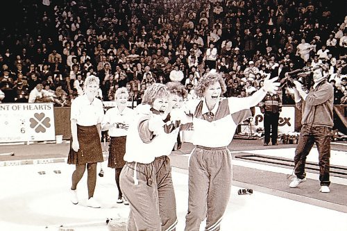 Manitoba's Maureen Bonar and Lois Fowler watch on as Saskatchewan's Marcia Gudereit, Joan McCusker and Jen Betker wait to celebrate with their skip Sandra Schmirler after they won the 1993 Scott Tournament of Hearts at the Keystone Centre. (Brandon Sun files)