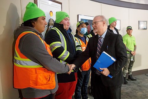 MIKE DEAL / WINNIPEG FREE PRESS
Justice Minister Kelvin Goertzen chats with members of the DCSP before making an announcement that the Manitoba government will be providing $150,000 to the Downtown Community Safety Partnership (DCSP) to establish the Clean Slate program for at-risk community members, focused on cleaning and maintenance of downtown Winnipeg.
230118 - Wednesday, January 18, 2023.