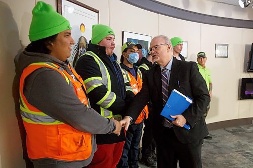 MIKE DEAL / WINNIPEG FREE PRESS
Justice Minister Kelvin Goertzen chats with members of the DCSP before making an announcement that the Manitoba government will be providing $150,000 to the Downtown Community Safety Partnership (DCSP) to establish the Clean Slate program for at-risk community members, focused on cleaning and maintenance of downtown Winnipeg.
230118 - Wednesday, January 18, 2023.