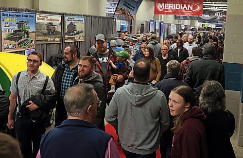 18012023
Crowds of people file through the hallways between showrooms at Manitoba Ag Days 2023 at the Keystone Centre on Wednesday.  (Tim Smith/The Brandon Sun)