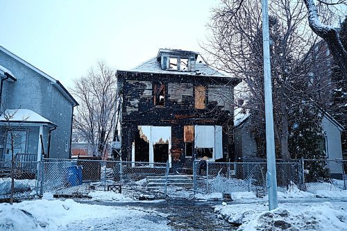 MIKE DEAL / WINNIPEG FREE PRESS
Winnipeg Fire Paramedic Service (WFPS) still at the scene of a fire that was called in around 11 p.m. Wednesday evening in a vacant, two-storey house at 446 Pritchard Avenue.
20230119 - Thursday, January 19, 2023