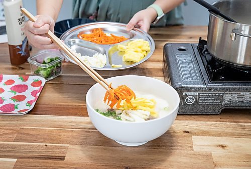 JESSICA LEE / WINNIPEG FREE PRESS

Minhee Kim is photographed preparing rice cake soup or Tteokguk in her home on January 16, 2023.

Reporter: Eva Wasney