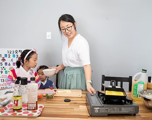 JESSICA LEE / WINNIPEG FREE PRESS

Minhee Kim and her children Dana, 5, and Yena, 3, are photographed preparing rice cake soup or Tteokguk in their home on January 16, 2023.

Reporter: Eva Wasney