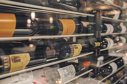 Wine bottles at Carne Italian Chophouse on York Avenue. November 5, 2106 (GREG GALLINGER / WINNIPEG FREE PRESS)