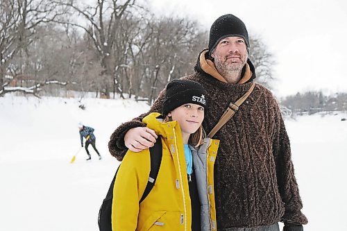 TYLER SEARLE / WINNIPEG FREE PRESS

Wolseley Winter Wonderland member Chris Beauvilain, 43, and his son Hugo, 11. Beauvilain is one of more than 40 volunteers who maintain the rinks and trails on the Assiniboine River between Omand's Creek and the Maryland Bridge in Wolseley.
