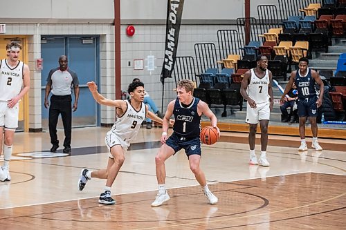 JESSICA LEE / WINNIPEG FREE PRESS

Mount Royal University Cougars player Holt Tomie (1) is photographed dribbling the ball during a game against The University of Manitoba Bisons at IG Athletic Centre on January 20, 2023.

Reporter: Mike Sawatzky