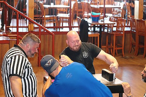 Matt Sedor tries to best fellow Winnipeg resident Kyle Backlund during a Saturday afternoon arm wrestling tournament in Brandon. This event was hosted by the Manitoba Arm Wrestling Association at Houstons Country Roadhouse. (Kyle Darbyson/The Brandon Sun)