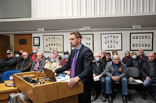 Brandon's director of planning and buildings Ryan Nickel outlines a brief timeline of the southwest lift station project at Monday's public hearing on the situation. (Colin Slark/The Brandon Sun)