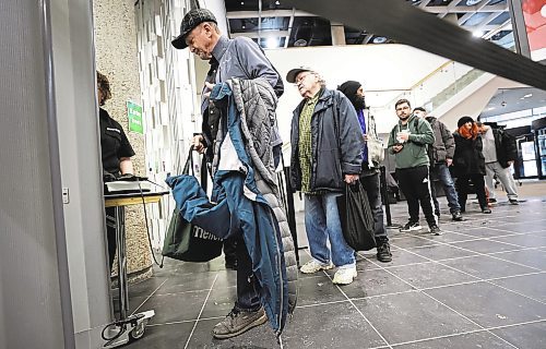 RUTH BONNEVILLE / WINNIPEG FREE PRESS 

Local - Library opens

Security personal check for dangerous metal objects on being carried by library users on the first day of the Millennium Library opening Monday.  Lineups formed during the first 45 mins due to the security checks.


See story.
Jan 23rd,  2023