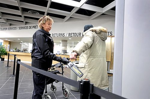 RUTH BONNEVILLE / WINNIPEG FREE PRESS 

Local - Library opens

Security personal check for dangerous metal objects on being carried by library users on the first day of the Millennium Library opening Monday.  Lineups formed during the first 45 mins due to the security checks.


See story.
Jan 23rd,  2023
