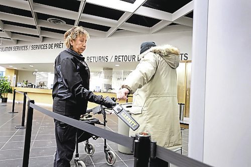RUTH BONNEVILLE / WINNIPEG FREE PRESS 

Local - Library opens

Security personal check for dangerous metal objects on being carried by library users on the first day of the Millennium Library opening Monday.  Lineups formed during the first 45 mins due to the security checks.


See story.
Jan 23rd,  2023