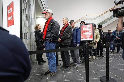 RUTH BONNEVILLE / WINNIPEG FREE PRESS
Local - Library opens
Security personal check for dangerous metal objects on being carried by library users on the first day of the Millennium Library opening Monday. Lineups formed during the first 45 mins due to the security checks.
See story.
Jan 23rd, 2023