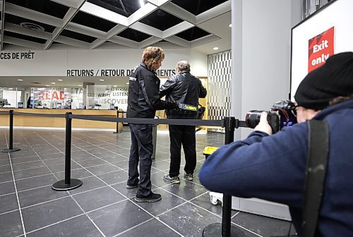 RUTH BONNEVILLE / WINNIPEG FREE PRESS
Local - Library opens
Security personal check for dangerous metal objects on being carried by library users on the first day of the Millennium Library opening Monday. Lineups formed during the first 45 mins due to the security checks.
See story.
Jan 23rd, 2023