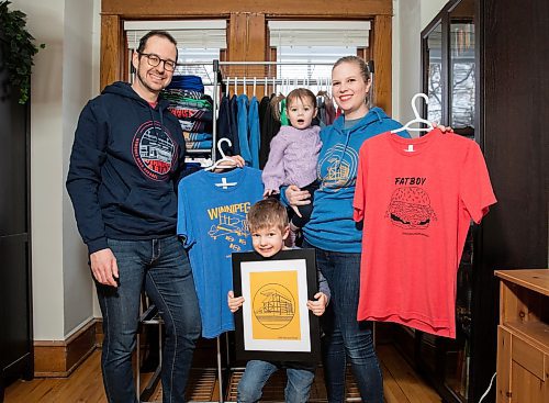 JESSICA LEE / WINNIPEG FREE PRESS

Heather and Sid Barkman and their children Penny, 1, and Arthur, 4, are photographed holding their apparel in their Winnipeg home on January 23, 2023. Their two-year-old venture, Maroons Road Apparel, depicts 10 different iconic Winnipeg images on t-shirts, hoodies and prints.

Reporter: Dave Sanderson