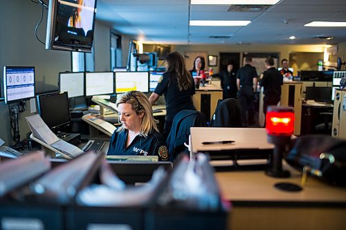 MIKAELA MACKENZIE / WINNIPEG FREE PRESS

Communication operator Cathy McKinnon takes a call at the 911 call centre in Winnipeg on Friday, Dec. 14, 2018. 

Winnipeg Free Press 2018.