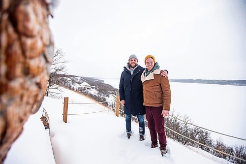 MIKAELA MACKENZIE / WINNIPEG FREE PRESS

Brett Sheffield (left) and Justin LeBlanc pose for a photo at the viewpoint (where they will host sunset yoga in the future) on the the Castleview Developments property, a 104 acre lot on Pelican Lake, in Manitoba on Tuesday, Jan. 24, 2023. They are planning on creating cabins, a wedding venue/corporate retreat, trails, and other amenities. Winnipeg Free Press 2023.