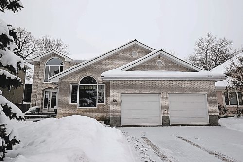 Photos by Todd Lewys / Winnipeg Free Press

This large home features a classy, low-maintenance brick exterior and a layout that cleverly splits the difference between modern and traditional floor plans.