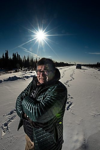 PHIL HOSSACK / WINNIPEG FREE PRESS - Michael Lawrenchuk poses at the 'end of the road' where Provincial Highway #290 ends North of Fox Lake. The farthest point north driveable in Manitoba. Melissa Martin Story. Feb 6, 2019