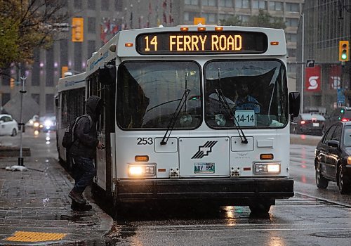 JESSICA LEE / WINNIPEG FREE PRESS

A pedestrian boards a bus downtown on October 13, 2022.

Reporter: Kevin Rollason