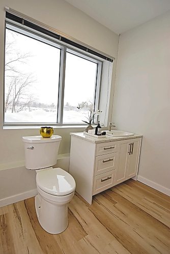 Todd Lewys / Winnipeg Free Press
Bathrooms will feature white vanities with granite countertops, Kohler fixtures and walk-in showers, chair-height elongated toilets and vinyl soaker tub/shower units.