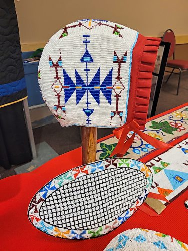 A beaded baby bonnet on display at the “Oceti Sakowin icipes unkikcupte,” or Taking Back the Seven Sacred Council Fires gathering of elders and knowledge keepers held at the Keystone Centre in Brandon on Tuesday and Wednesday. (Miranda Leybourne/The Brandon Sun)